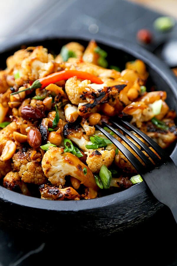 Kung Pao Cauliflower - A delicious alternative to classic Kung Pao Chicken, Kung Pao Cauliflower is just as smoky and satisfying but lower in calories and fat! Recipe, Chinese food, take out, healthy, cauliflower, vegetarian, Asian | pickledplum.com