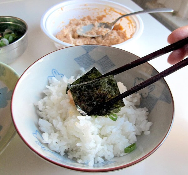 eating spicy tuna with rice chopsticks spicy tuna salad