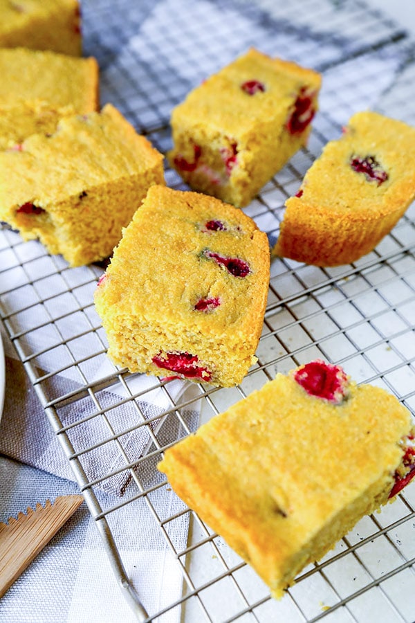 Gluten Free Cranberry Cornbread - This fruit studded Gluten Free Cranberry Cornbread Recipe is soft, subtly sweet and 100% delicious. Thanksgiving gluten free recipes, Christmas gluten free recipes, gluten baked goods, gluten free dessert, gluten free side dish | pickledplum.com