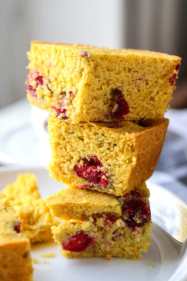Gluten Free Cranberry Cornbread - This fruit studded Gluten Free Cranberry Cornbread Recipe is soft, subtly sweet and 100% delicious. Thanksgiving gluten free recipes, Christmas gluten free recipes, gluten baked goods, gluten free dessert, gluten free side dish | pickledplum.com