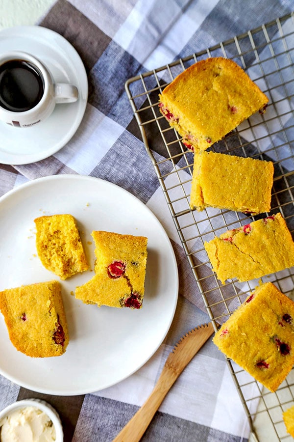Gluten Free Cranberry Cornbread - This fruit studded Gluten Free Cranberry Cornbread Recipe is soft, subtly sweet and 100% delicious. Thanksgiving gluten free recipes, Christmas gluten free recipes, gluten baked goods, gluten free dessert, gluten free side dish | pickledplum.com