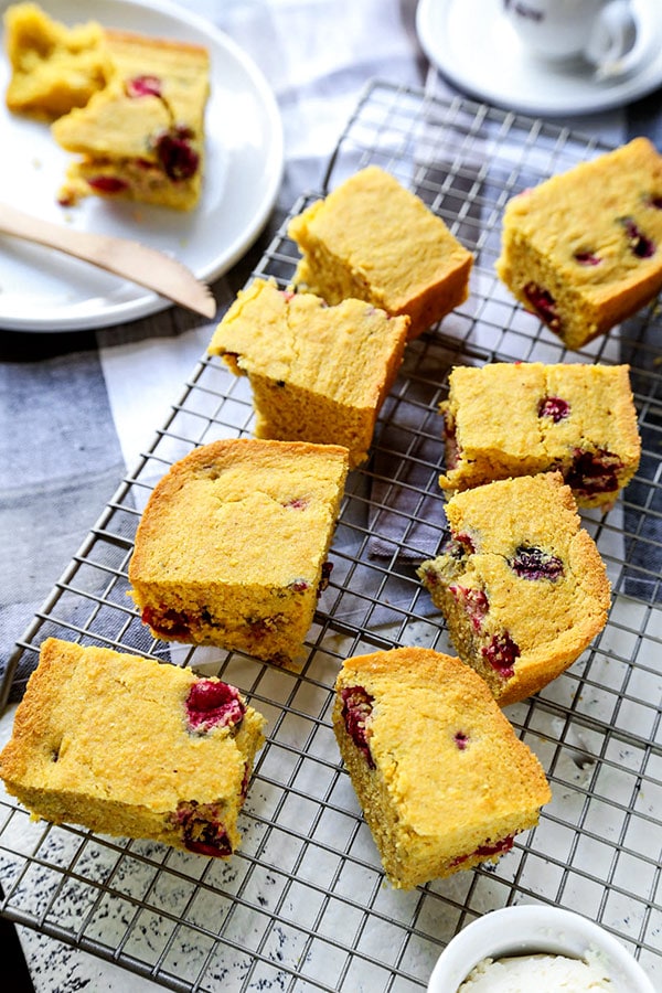 Gluten Free Cranberry Cornbread - This fruit studded Gluten Free Cranberry Cornbread Recipe is soft, subtly sweet and 100% delicious. Thanksgiving gluten free recipes, Christmas gluten free recipes, gluten baked goods, gluten free dessert, gluten free side dish | pickledplum.com